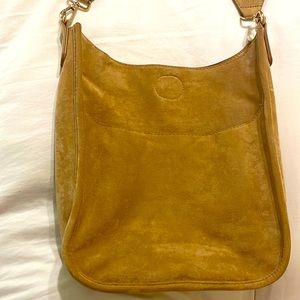 Ah-adorned Cross Body tan suede purse with adjustable strap